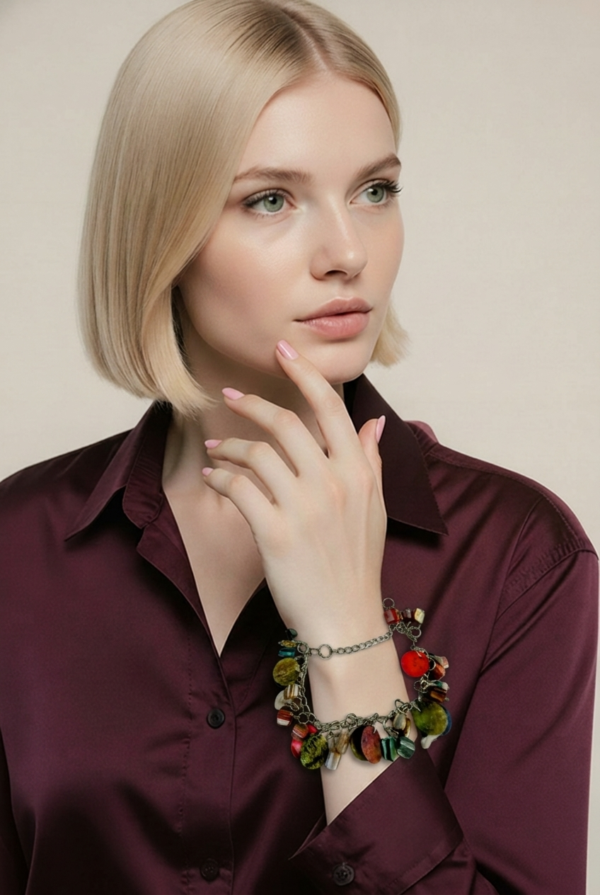 Accessory>Jewelry                                Bracelet w/ metallic charms.